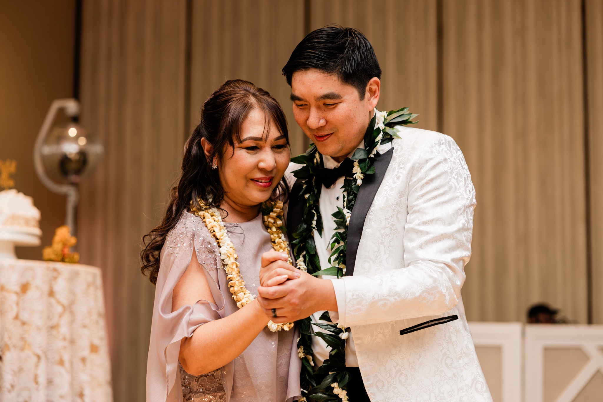 Mitchell and Alina share a first dance at their Oahu wedding